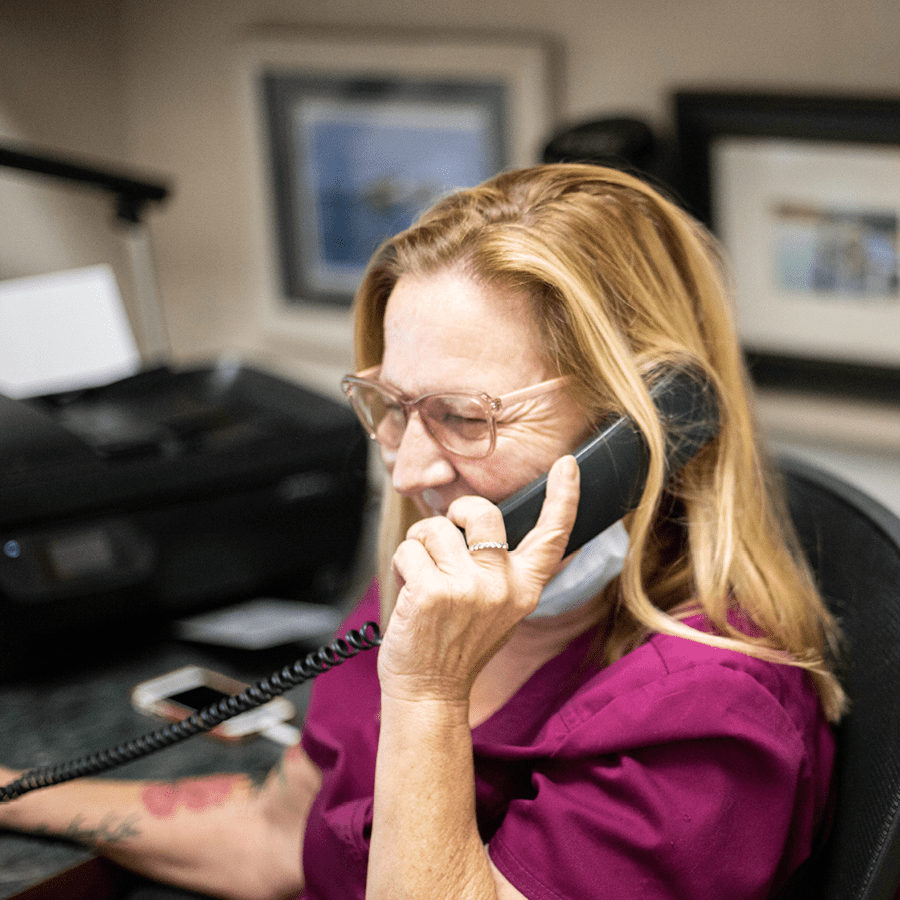 Larger_PetDesk_Case Studies_Launching Loyalty_A Veterinary CSR talking happily on the phone