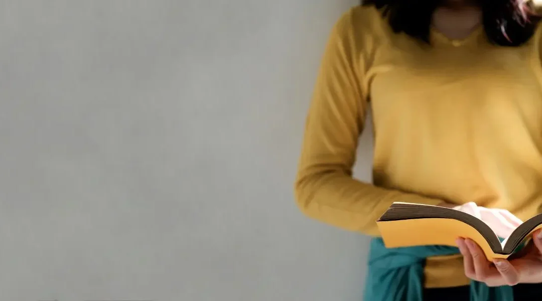 Woman holding a book
