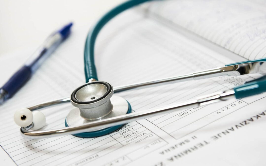 Stethoscope on top of a chart