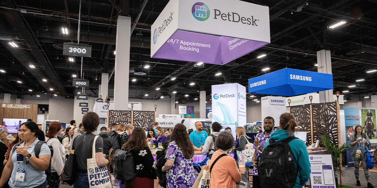 AVMA-2025 Big group gathering at the PetDesk Booth at a convention